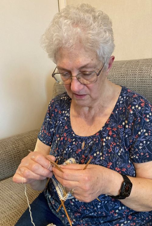 Knitting for hats in progress with Barbara