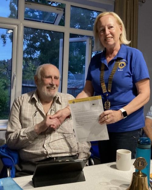 Long Service 36 year award given to Lion Eric by LP Susan at club meeting